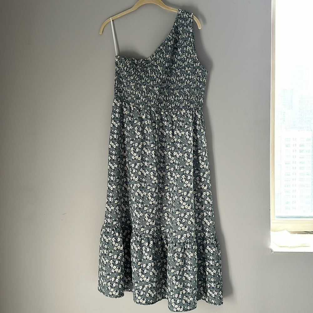 Ruched one shoulder dress.